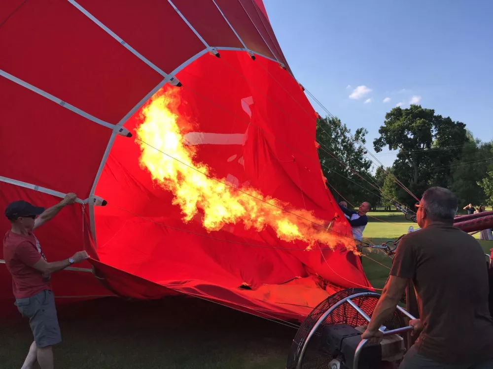 Crew inflating a hot air balloon before take-off close to Gillingham