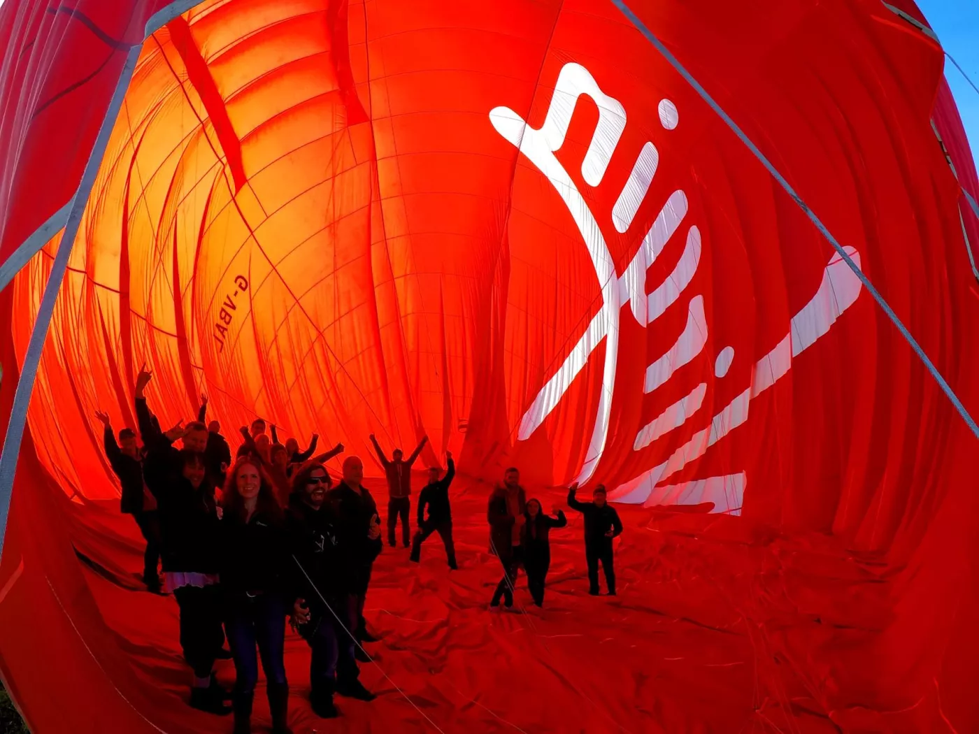 Passengers standing inside a hot air balloon before deflating near Worcester