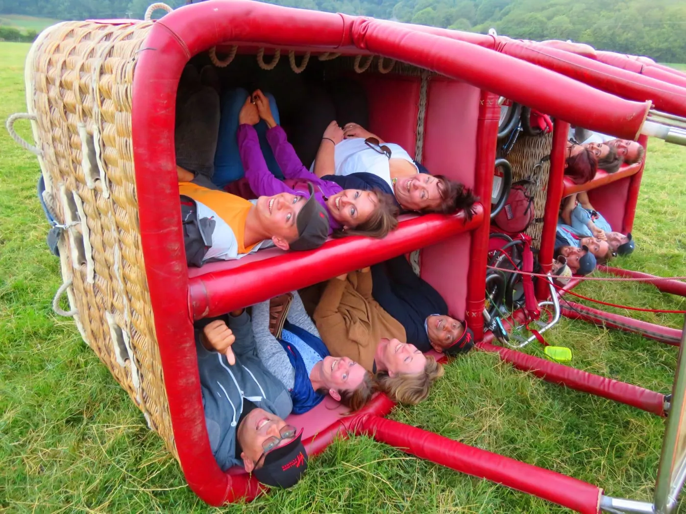 Passengers in a balloon basket after landing